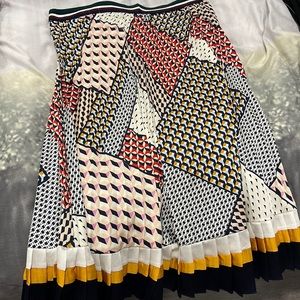 Skirt brand is skies are blue, size large and colorful